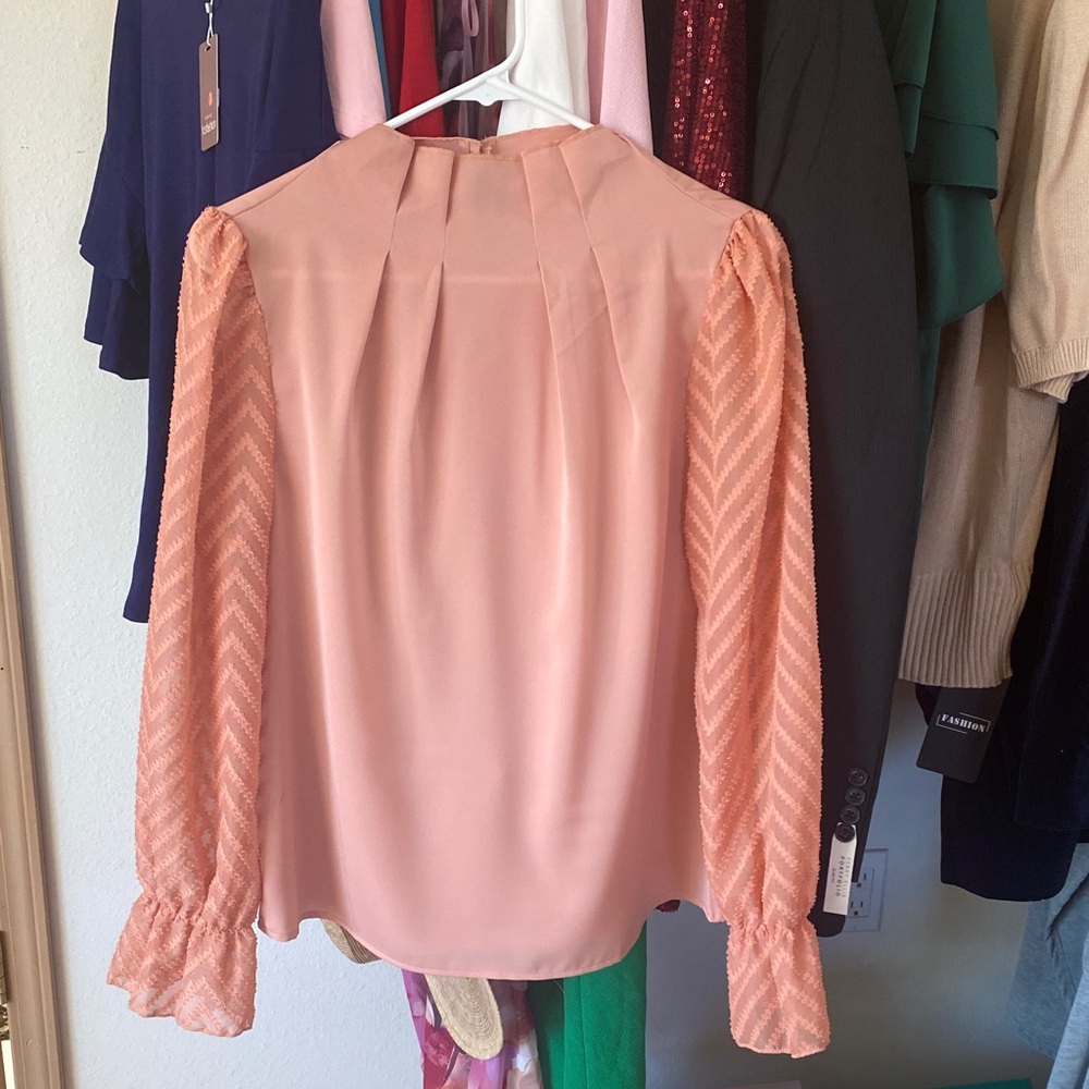 Elegant Peach Blouse with Textured Sleeves